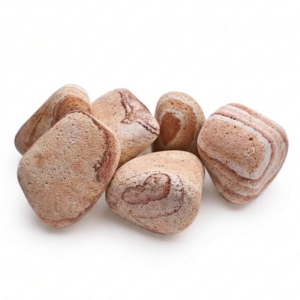 Smooth pink-beige river stones with natural swirling patterns and heart-shaped markings on a white background