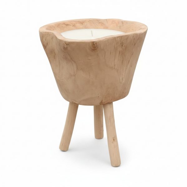 Three‑legged natural wood pedestal with a shallow bowl holding a white candle (candle in a wooden vessel).